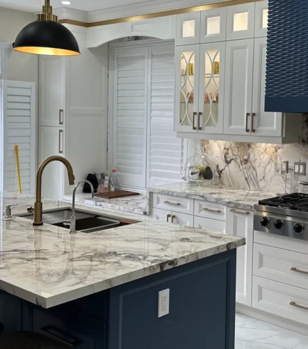 A beautiful white and blue theme kitchen designed and installed by Titan Cabinetry