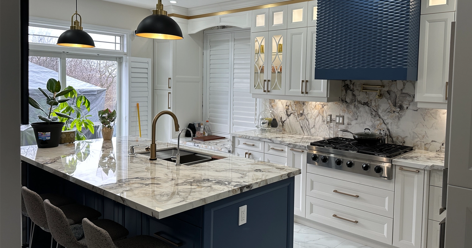 A beautiful white and blue theme kitchen designed and installed by Titan Cabinetry